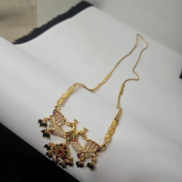 macro peacock llong black beed 30 inchs