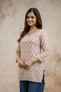 Women Printed Viscose Rayon Straight Kurta (Beige) - S