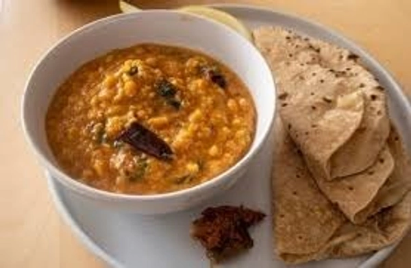 Dal Tadka + 4 Butter Roti + Achar
