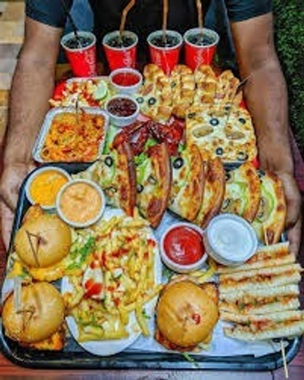 Family Pack - Maxican Burger (2 Piece) , Paneer Wrap (2 Piece) , Special Sandwich (1 Piece) , Tandoori Paneer Tikka Pizza(1 Large) , Cold Drink 250 ML (4 Glass