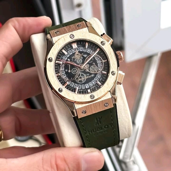 Big Bang in golden Dial & Green Colour Hublot Og Watch