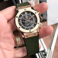 Big Bang in golden Dial & Green Colour Hublot Og Watch