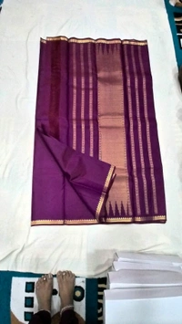 Elegant Wine-Purple Kanchipuram Silk Saree with Temple Border