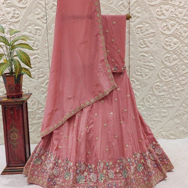 Purvastra peach bandhej lehenga