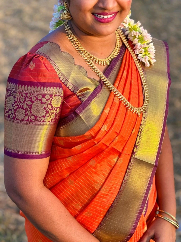 Kataan Rust Checked Buti Saree