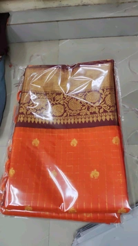 Kataan Rust Checked Buti Saree