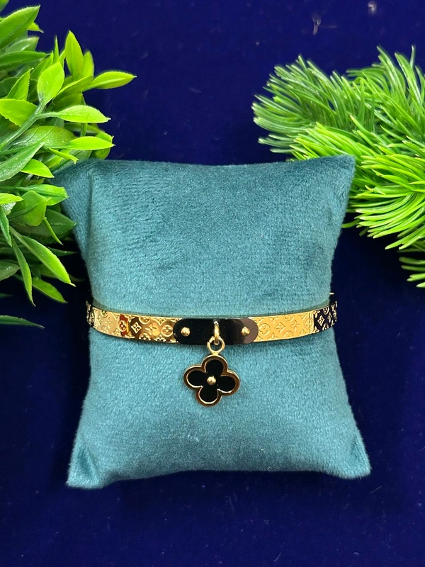 Gilded Icon Clover Charm Bracelet