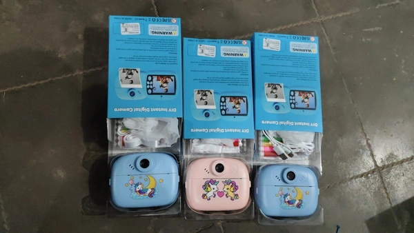 Dino printed click and print camera | Click and print your Black and white picture