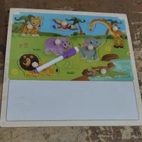 Wooden puzzle board with whiteboard on the bottom
