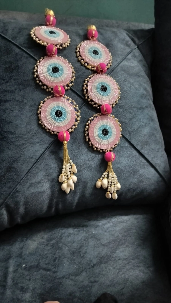 Evil eye hangingPair Pink, yellow n blue color available Latkan will be different