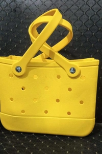 Crocs bag restocked in a new size Charms included