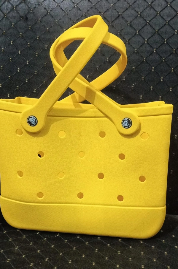 Crocs bag restocked in a new size Charms included