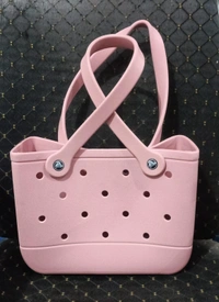Crocs bag restocked in a new size Charms included