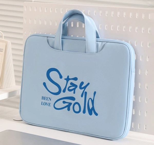 laptop bag with "Stay Gold" 