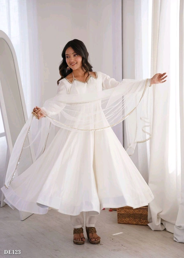 Pure Romansilk Chanderi Flared Anarkali Set with Dupatta and Pant, Ready to Wear, Offwhite.
This is a fully flared Anarkali set made from pure Romansilk Chanderi fabric. It comes with a soft nylon net dupatta with fancy mirror lace, and a free size stitched pant in matching fabric.
Simple Anarkali set for Kurtis & Kurtas with a clean and easy style. - S