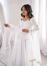 Pure Romansilk Chanderi Flared Anarkali Set with Dupatta and Pant, Ready to Wear, Offwhite.
This is a fully flared Anarkali set made from pure Romansilk Chanderi fabric. It comes with a soft nylon net dupatta with fancy mirror lace, and a free size stitched pant in matching fabric.
Simple Anarkali set for Kurtis & Kurtas with a clean and easy style. - S