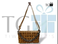 LIGHT BROWN Faux PU LEATHER SLING BAG WITH A WOVEN MAT DESIGN AND A METAL CHAIN ACCENT.