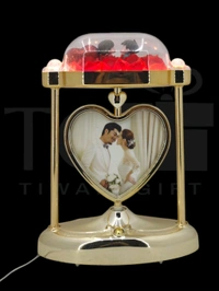 a personalized heart-shaped LED photo frame lamp with a rotating center photo display.
