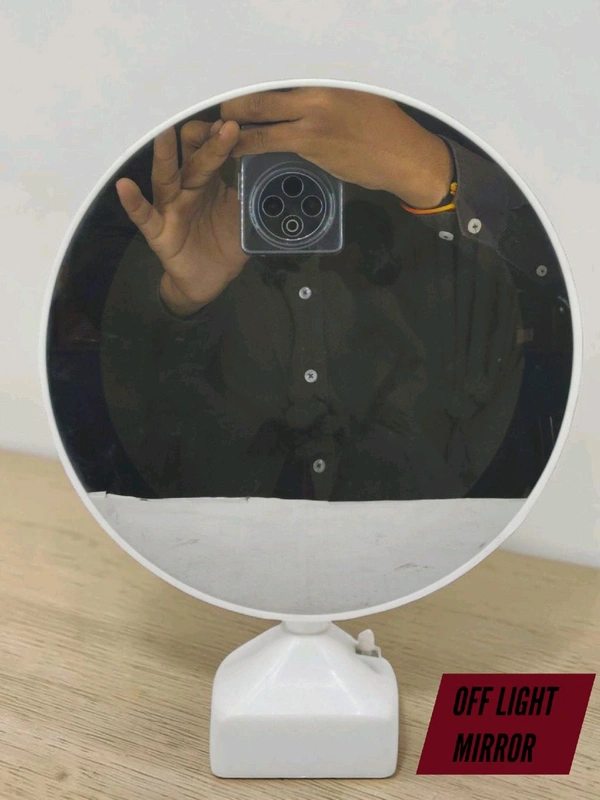 TaffHome Magic Mirror with Photo Frame is a functional table mirror that turns into an illuminated photo frame when connected to electricity.
