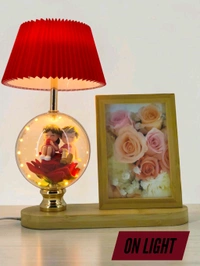 a personalized photo frame and couple figurine night lamp decorative table lamp.