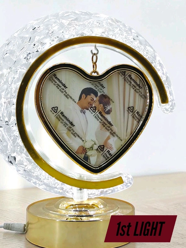 personalized crystal LED crescent moon lamp with a rotating heart-shaped photo frame.
