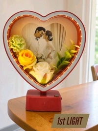 heart-shaped LED photo frame, often referred to as a "magic mirror" frame, designed for personalized gifting and home decor with built-in flowers and lighting.