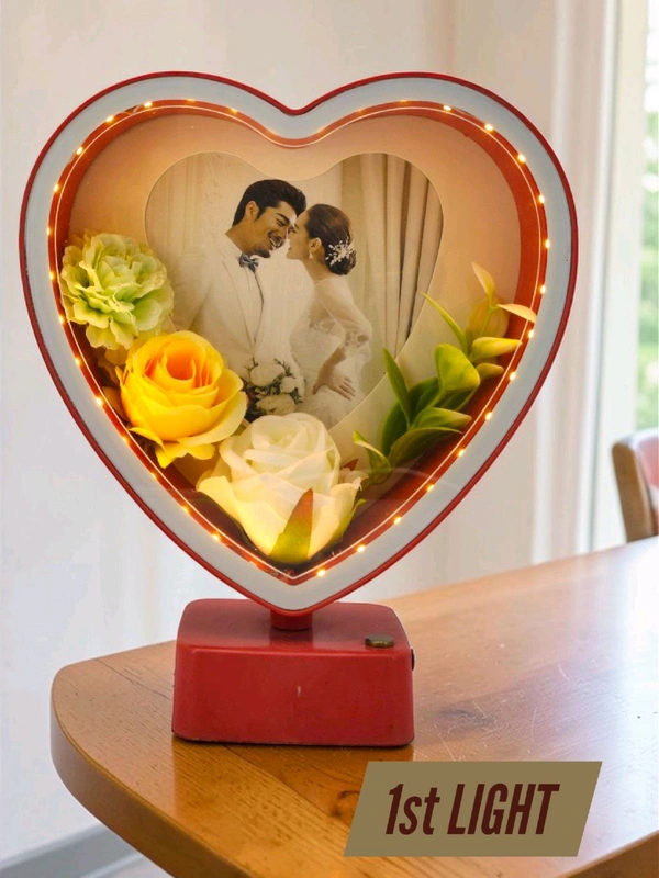 heart-shaped LED photo frame, often referred to as a "magic mirror" frame, designed for personalized gifting and home decor with built-in flowers and lighting.