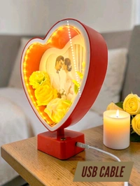 heart-shaped LED photo frame, often referred to as a "magic mirror" frame, designed for personalized gifting and home decor with built-in flowers and lighting.