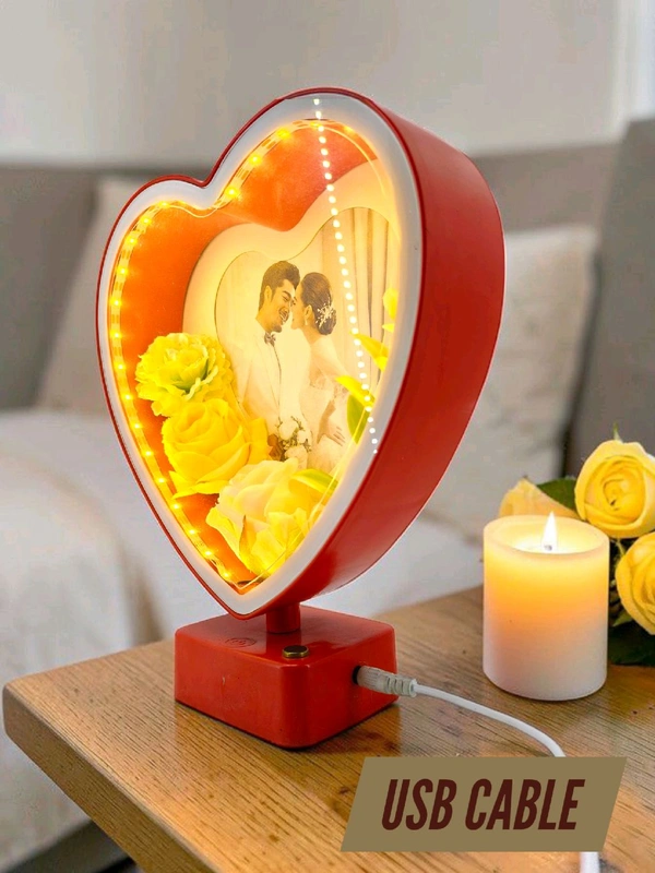 heart-shaped LED photo frame, often referred to as a "magic mirror" frame, designed for personalized gifting and home decor with built-in flowers and lighting.