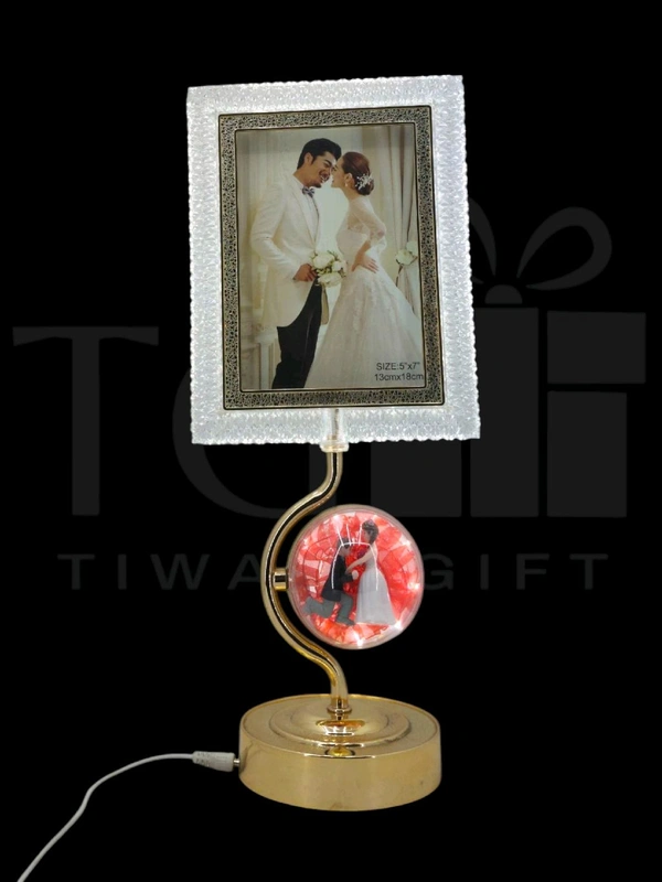 a decorative LED photo frame and lamp featuring a romantic wedding theme, likely from a brand specializing in home decor gifts.