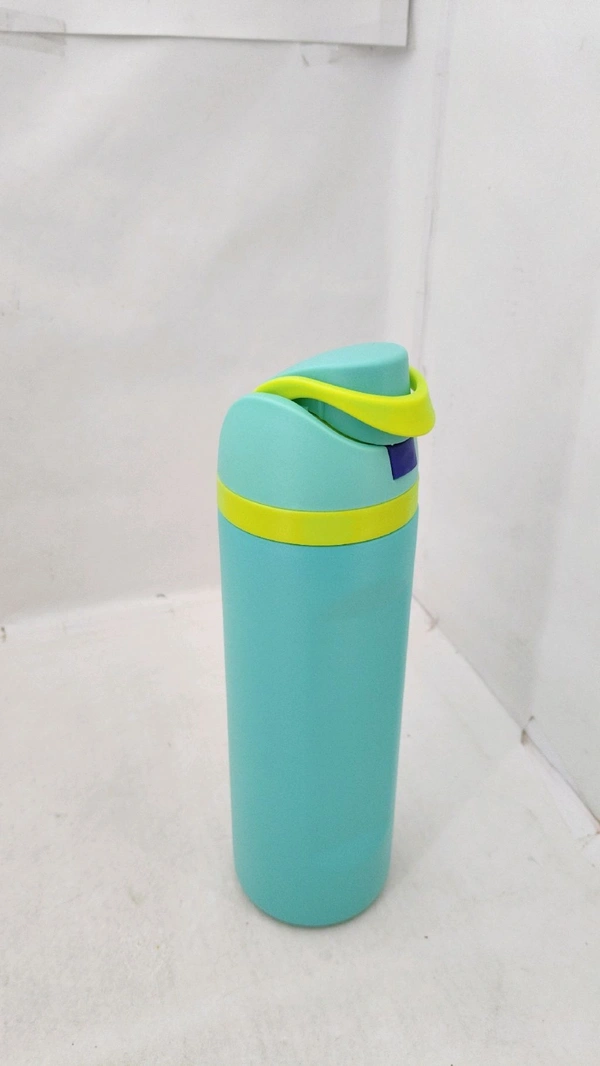 an insulated stainless steel water bottle, specifically matching the design of the Owala FreeSip bottle, which features a patented 2-in-1 spout for sipping or swigging.