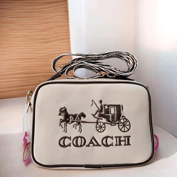 This is a Coach Women's Jes Crossbody bag featuring the iconic Horse and Carriage.