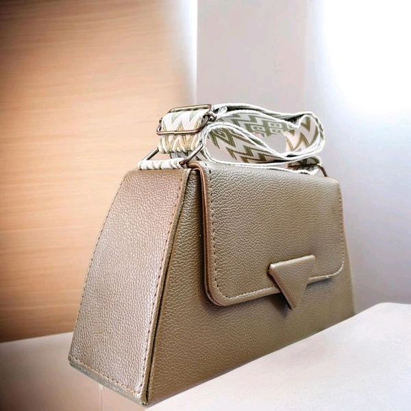 Aldo Softpuff shoulder bag features a structured silhouette in bordo faux leather and a distinctive patterned strap.