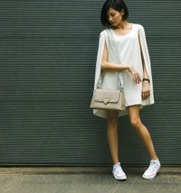 Aldo Softpuff shoulder bag features a structured silhouette in bordo faux leather and a distinctive patterned strap.