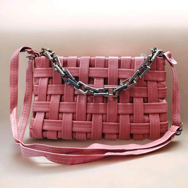 This Pink generic Shilpikraft shoulder sling bag features a unique woven pattern and a prominent silver chain strap.