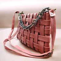 This Pink generic Shilpikraft shoulder sling bag features a unique woven pattern and a prominent silver chain strap.