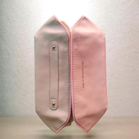 This Pink. PU leather cosmetic bag is branded with "ROSE OF NO MAN'S LAND.