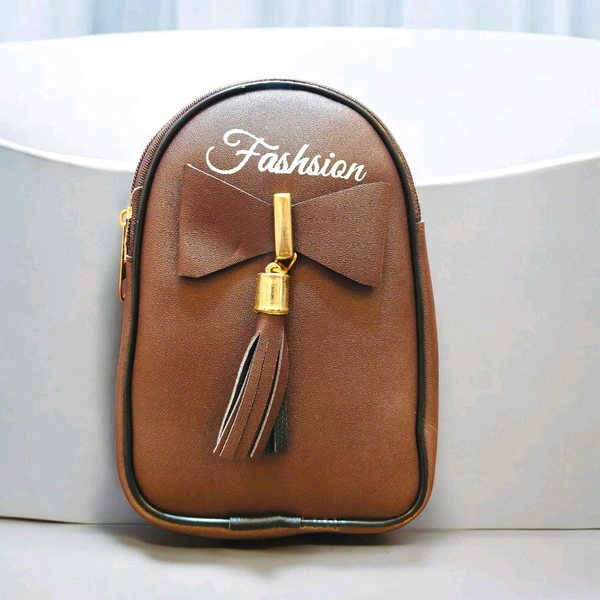 This ZB Luxury brown faux leather satchel features a distinctive front bow detail and "Fashsion" branding