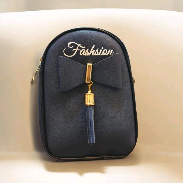 This ZB Luxury Black faux leather satchel features a distinctive front bow detail and "Fashsion" branding