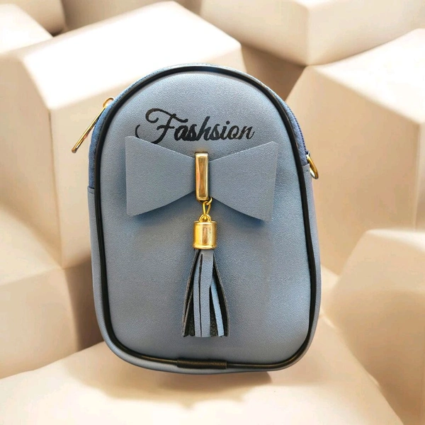This ZB Luxury Blue faux leather satchel features a distinctive front bow detail and "Fashsion" branding
