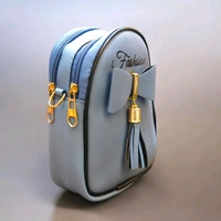 This ZB Luxury Blue faux leather satchel features a distinctive front bow detail and "Fashsion" branding