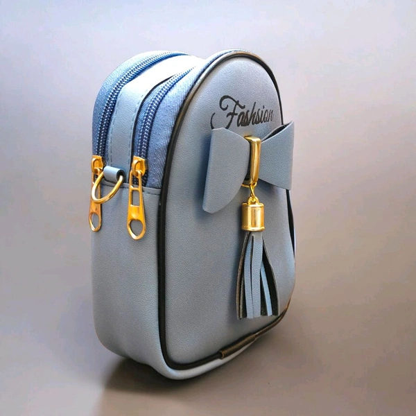 This ZB Luxury Blue faux leather satchel features a distinctive front bow detail and "Fashsion" branding
