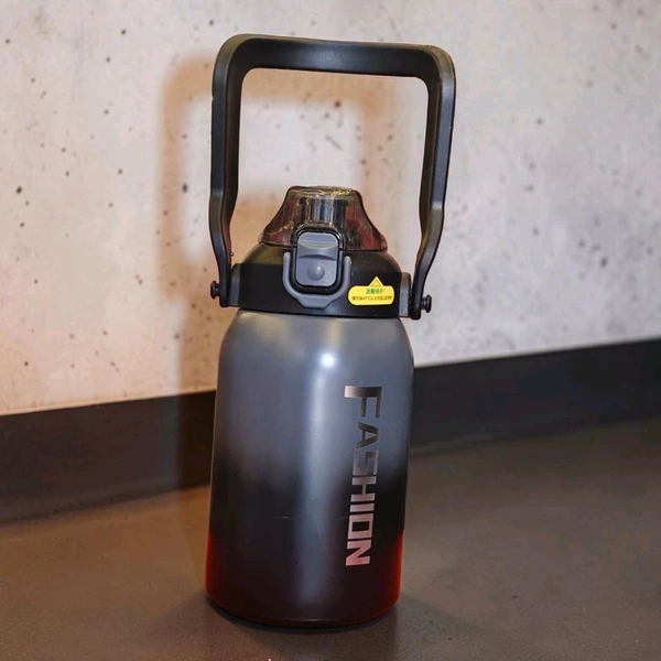 This is a Mumiguan 44-ounce insulated water bottle featuring a grey-black gradient design and a top carry handle.