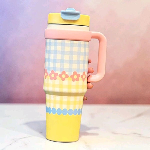 This is a Glacora insulated tumbler featuring a charming pink and blue gingham pattern with floral and dot accents.