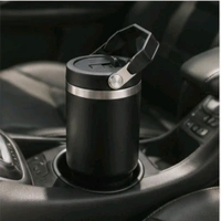 This is likely a black stainless steel vacuum insulated tumbler with a top handle, similar to models from brands like Pick Sip or Star Work.