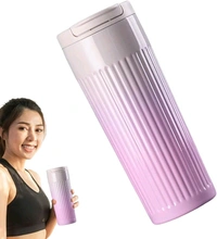 This white, vertical-striped travel tumbler features a vacuum-insulated stainless steel design with a pop-up lid.