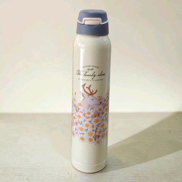 This stainless steel vacuum insulated water bottle features a "Lovely Elves" printed design with a deer and flowers.