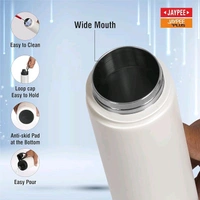 This is a white, insulated stainless steel vacuum bottle with a black, screw-top lid.