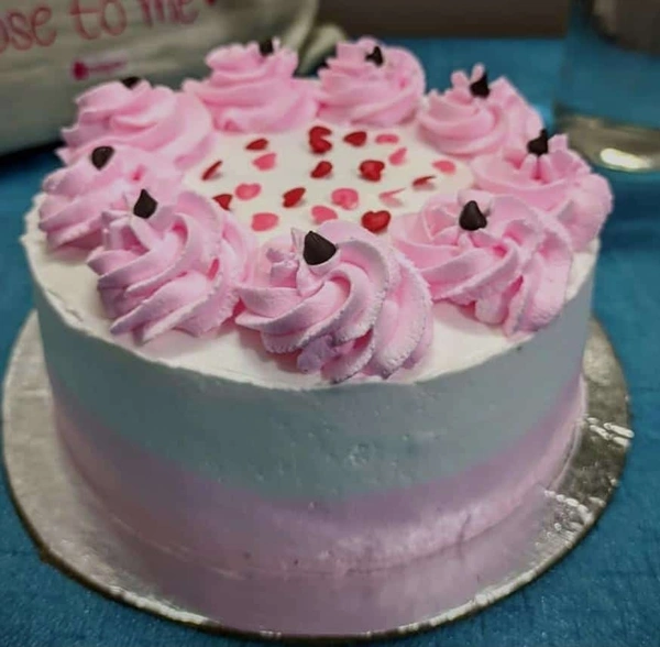 Vanilla Cake With Strawberry On Top - White and pink.