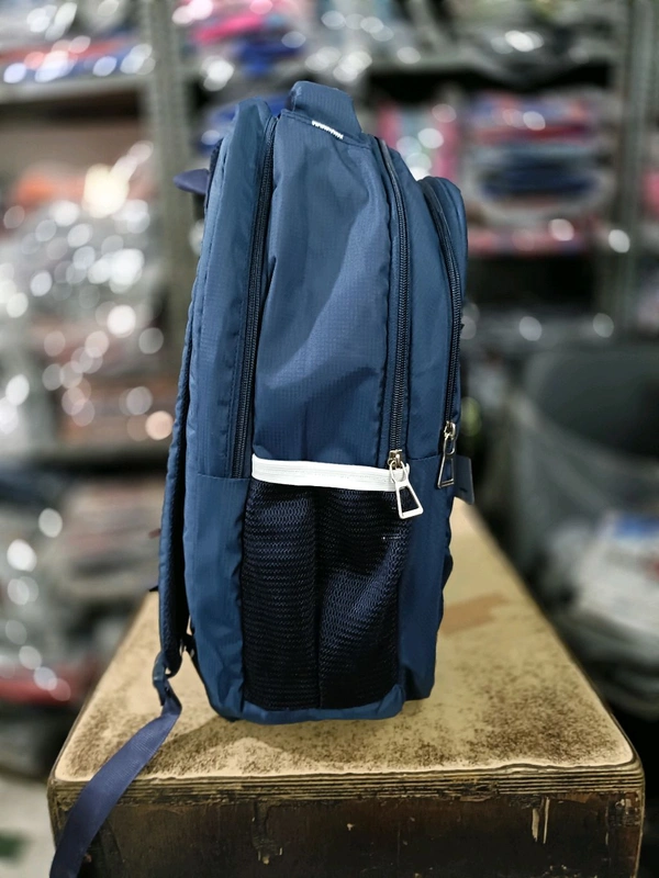 American Tourister Pbh AT P041 LAPTOP 18*14*6 SOFT POLYSTER WITH INNER POCKET LOWER PADDED BACKPACK - Cornflower Blue, 18*14*6